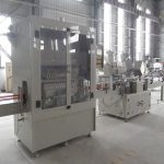 Samodejna linija za polnjenje jedke tekočine v steklenice z zamaškom