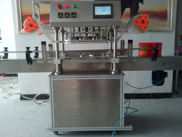 automatic three heads jars sealing equipment stroj za zapiranje kozarcev.jpg