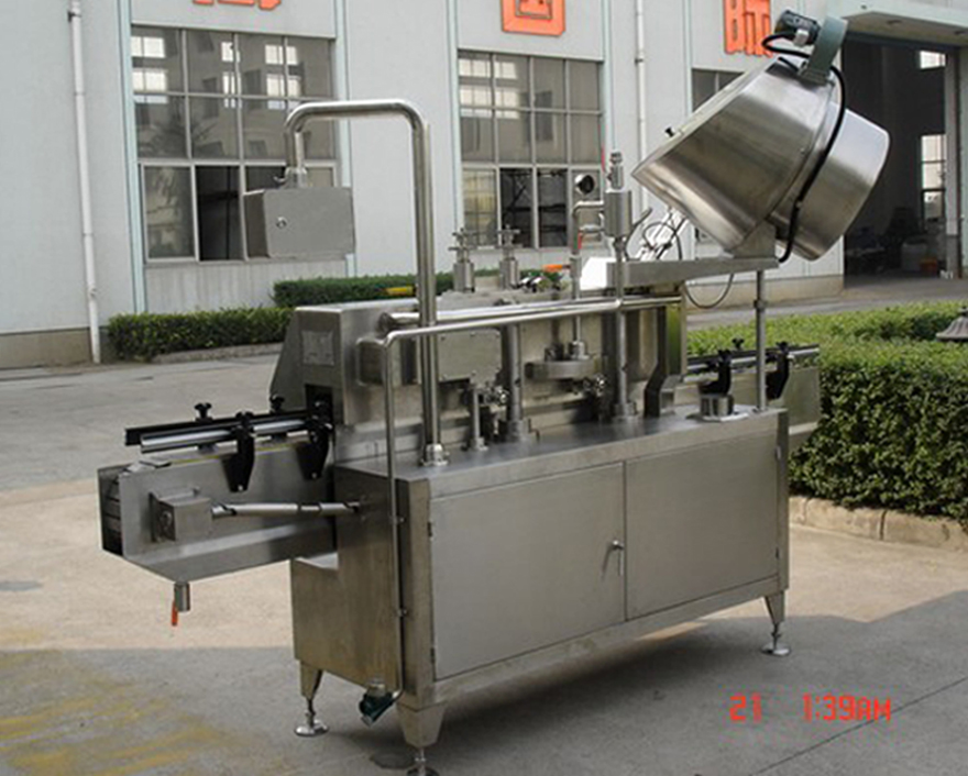 PLC-controlled system glass Jar twist off Steam Capper equipment vacuum capping machine for Glass Jars zadnji posnetek vakuumske kapice twist-off.jpg