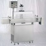 Stroj za neprekinjeno indukcijsko zapiranje steklenic iz aluminijaste folije