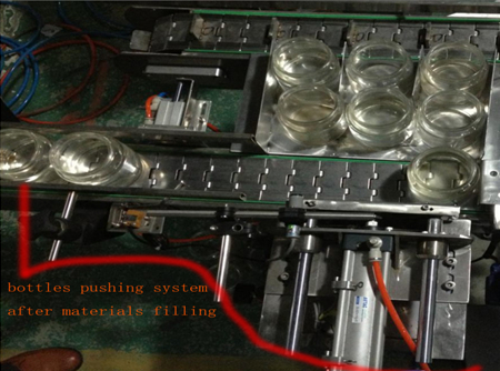 automatic bottles pushing system after filing sistem za potiskanje steklenic.jpg